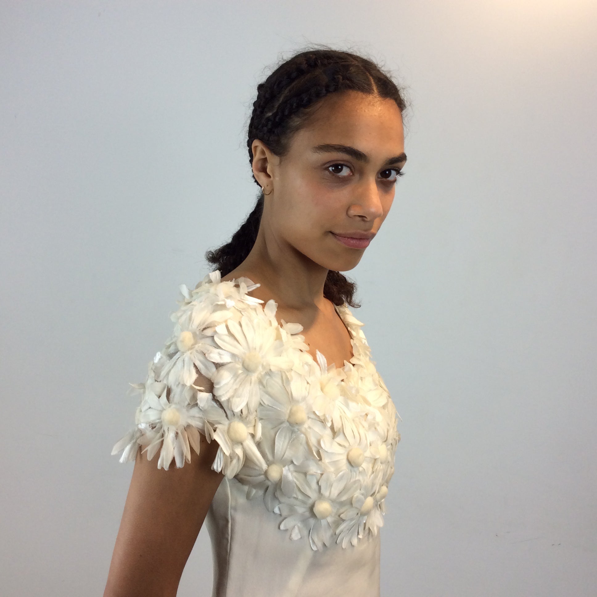 Close up side view of 1970s Daisy Embellished Ivory Organza Maxi Dress 
Size Small
Sold at bohemevintage.com
Montréal