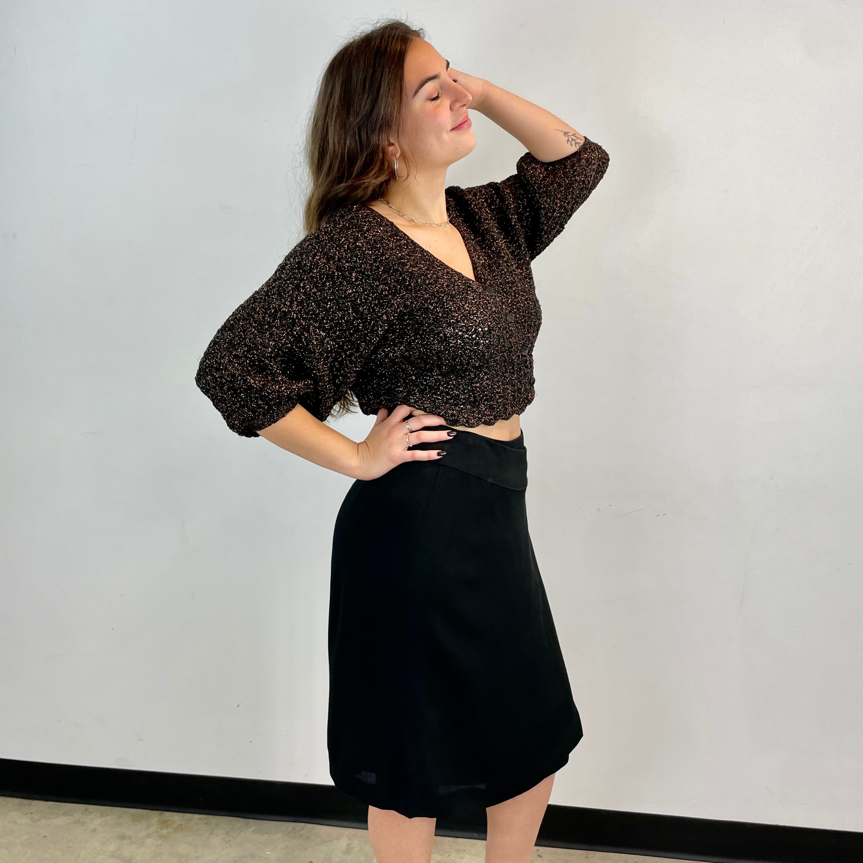 Side view of Emporio Armani Designer Black Wrap Skirt Size Medium sold at bohemevintage.com Montreal