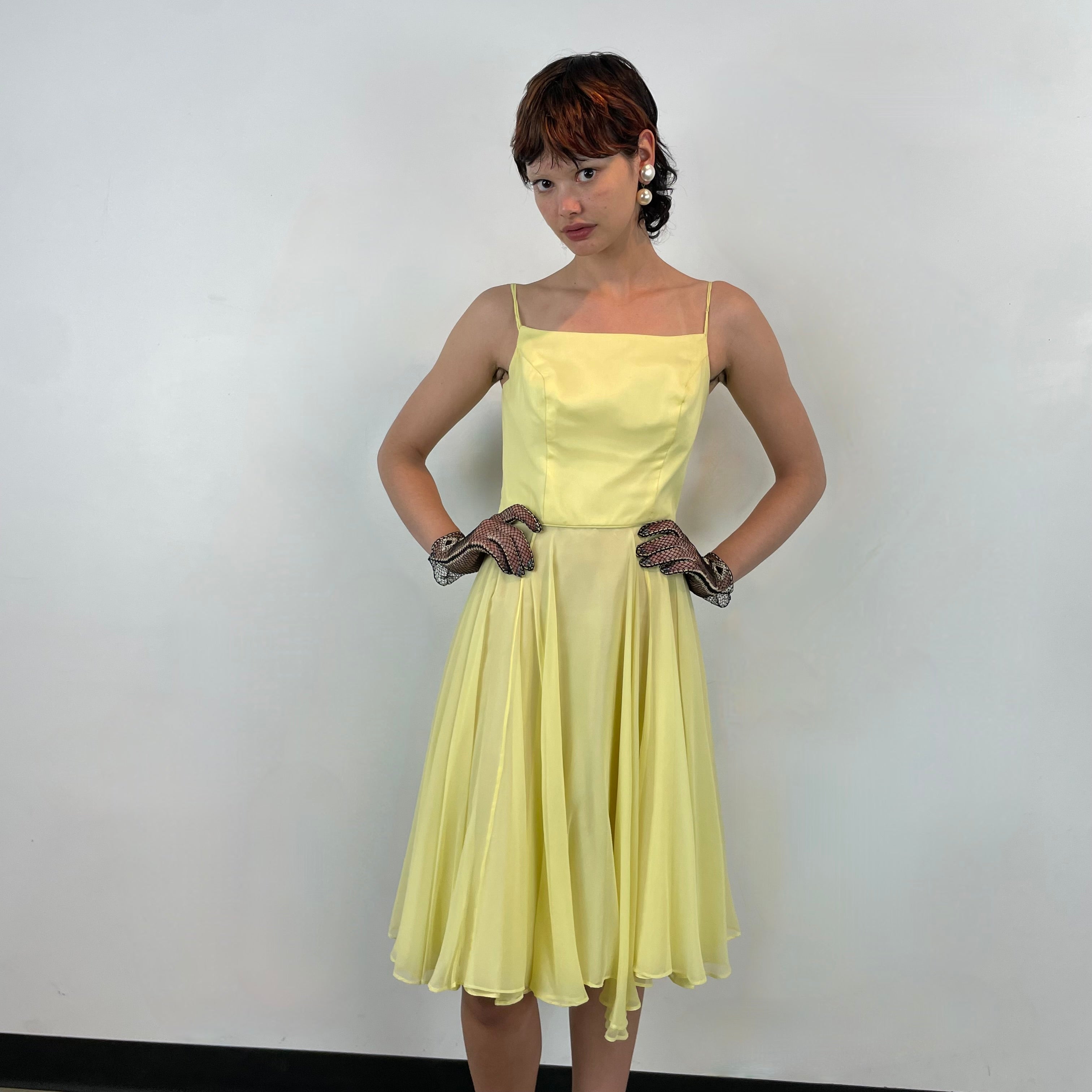 Front view of 1960s Yellow Chiffon Cocktail Dress 
size Small
sold at bohemevintage.com 
Montréal