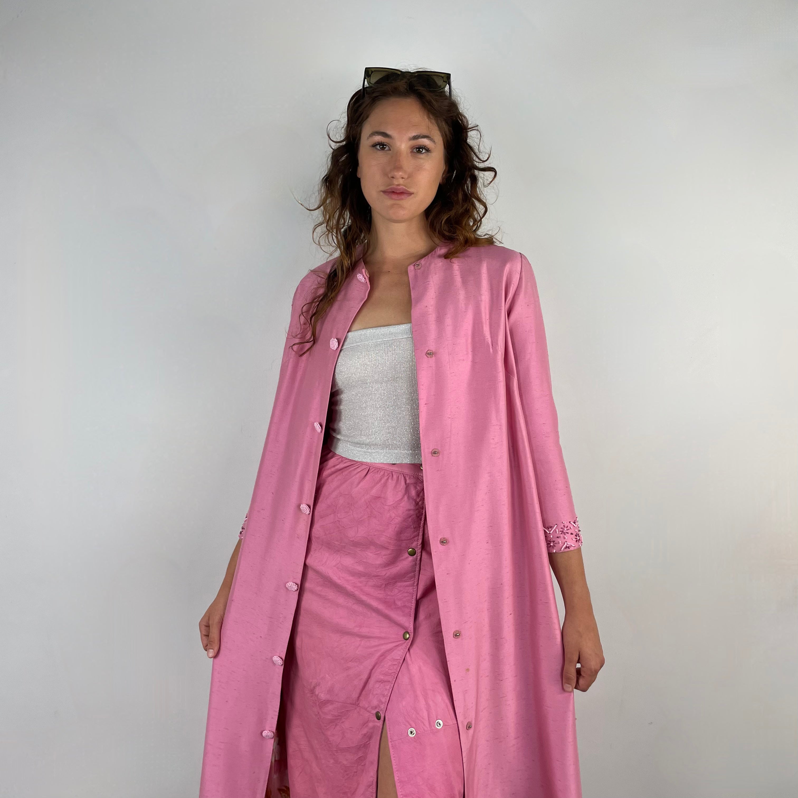 Front view of 1980s Robert Krief Designer Pink Leather Midi Skirt 
Size Small/Medium
Sold at bohemevintage.com 
Montréal 
