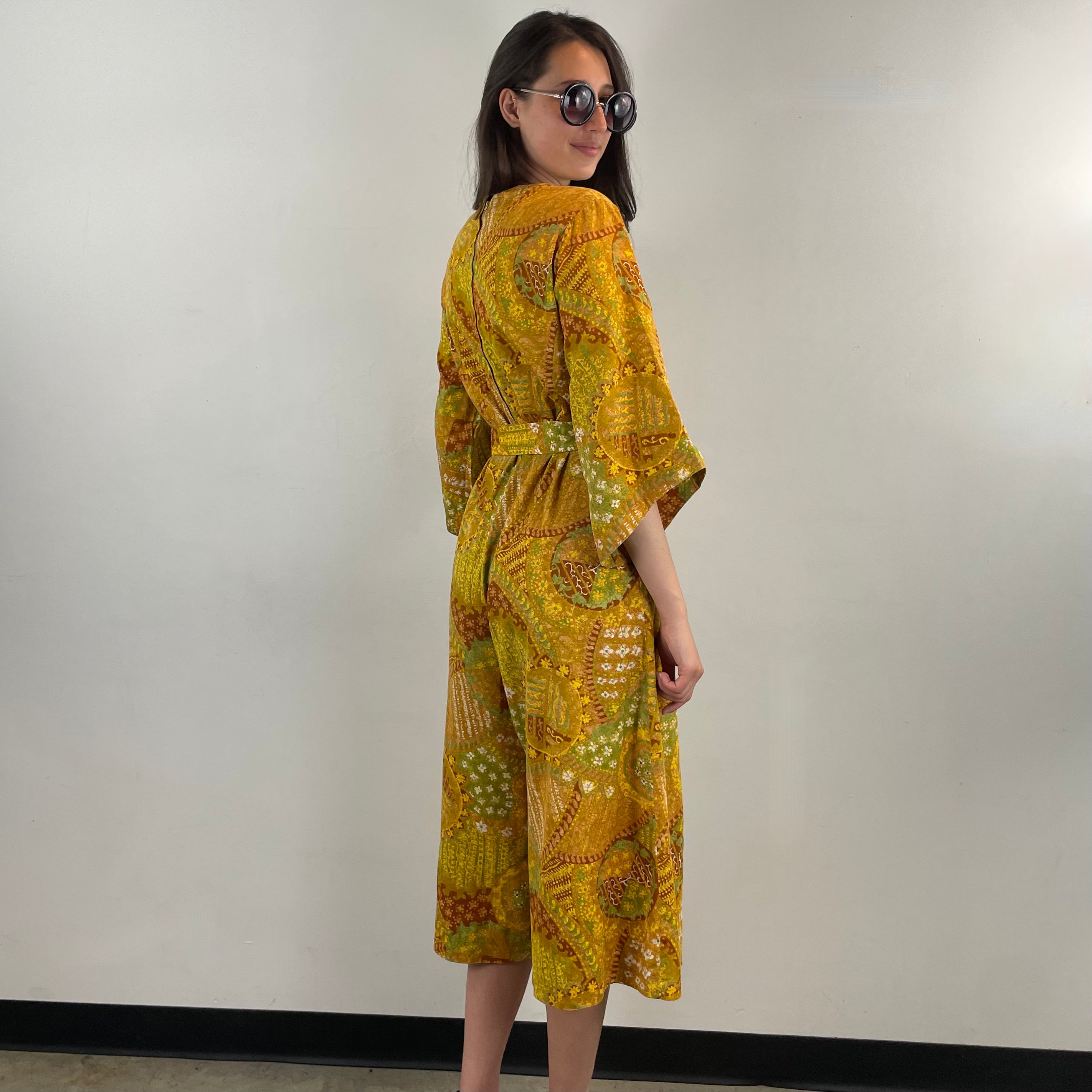 Side view of 1970s Bold Print Cropped Jumpsuit 
One Size
Sold at bohemevintage.com, Montréal