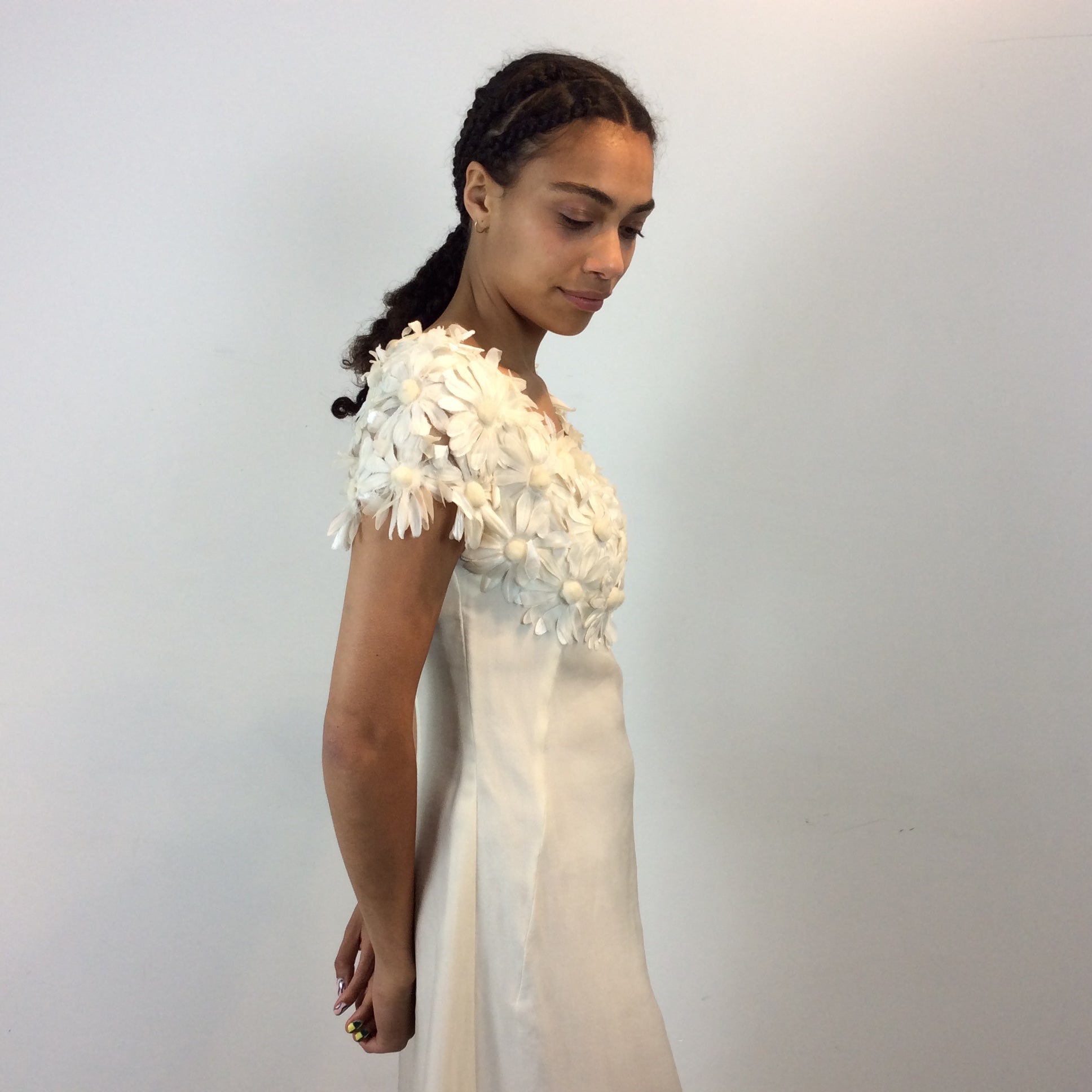 Close up side view of 1970s Daisy Embellished Ivory Organza Maxi Dress 
Size Small
Sold at bohemevintage.com
Montréal