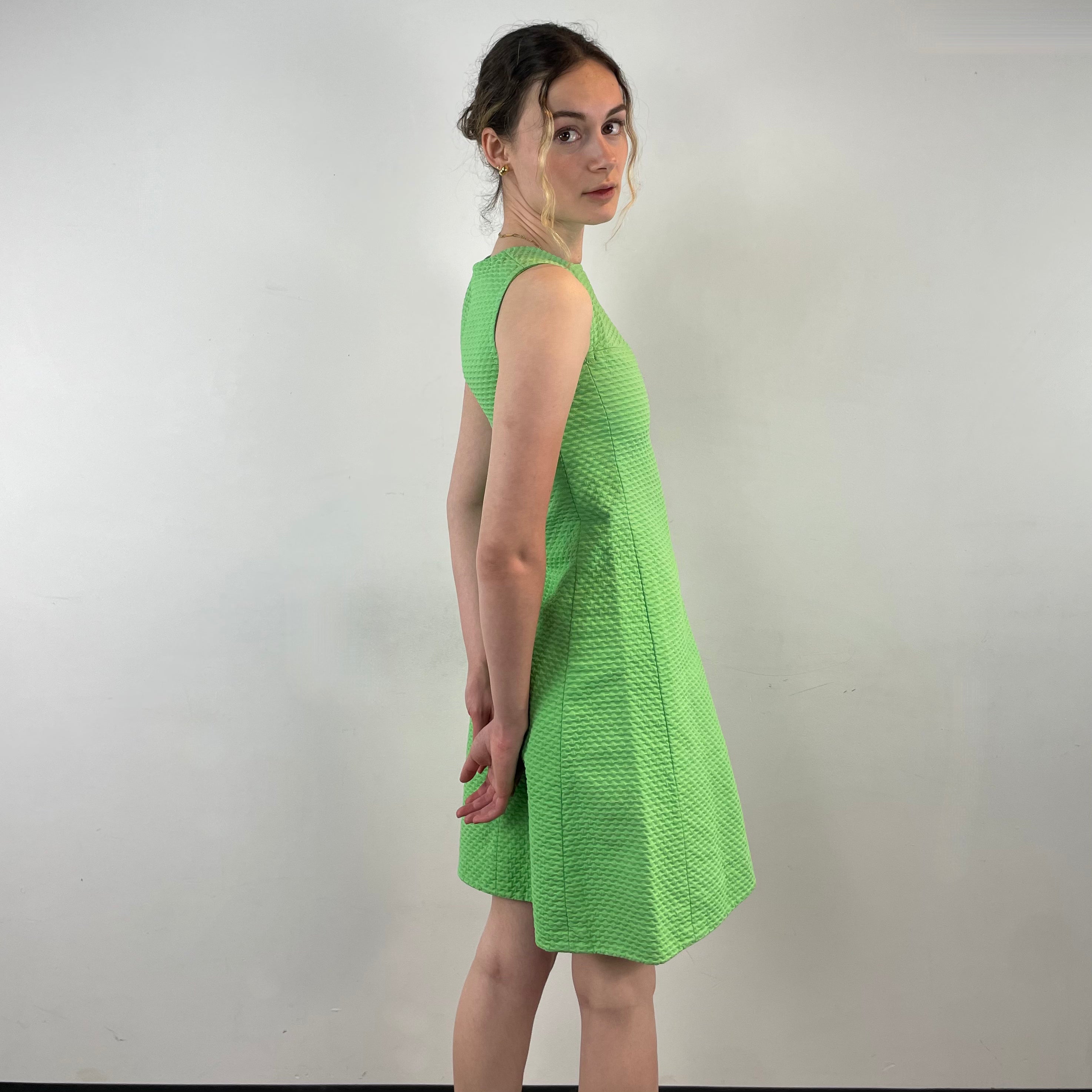 Side view of 1960s Lime Green Cotton Mini Shift Dress 
size Small
sold at bohemevintage.com
Montréal