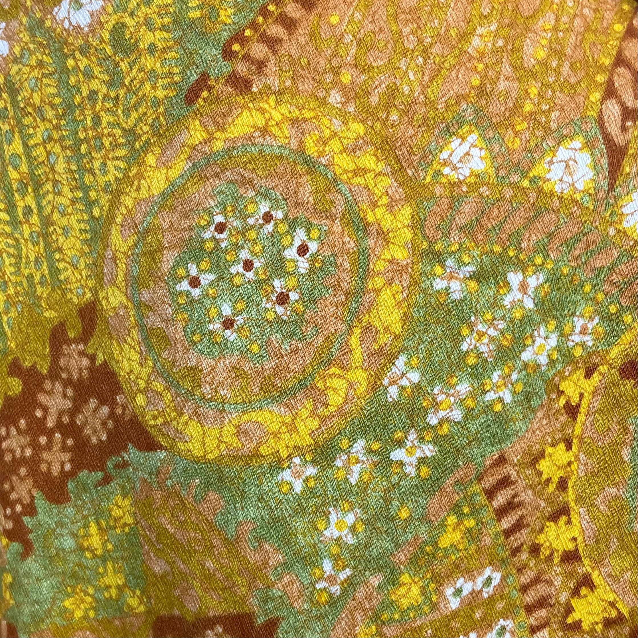 Close up view of fabric of 1970s Bold Print Cropped Jumpsuit 
One Size
Sold at bohemevintage.com, Montréal