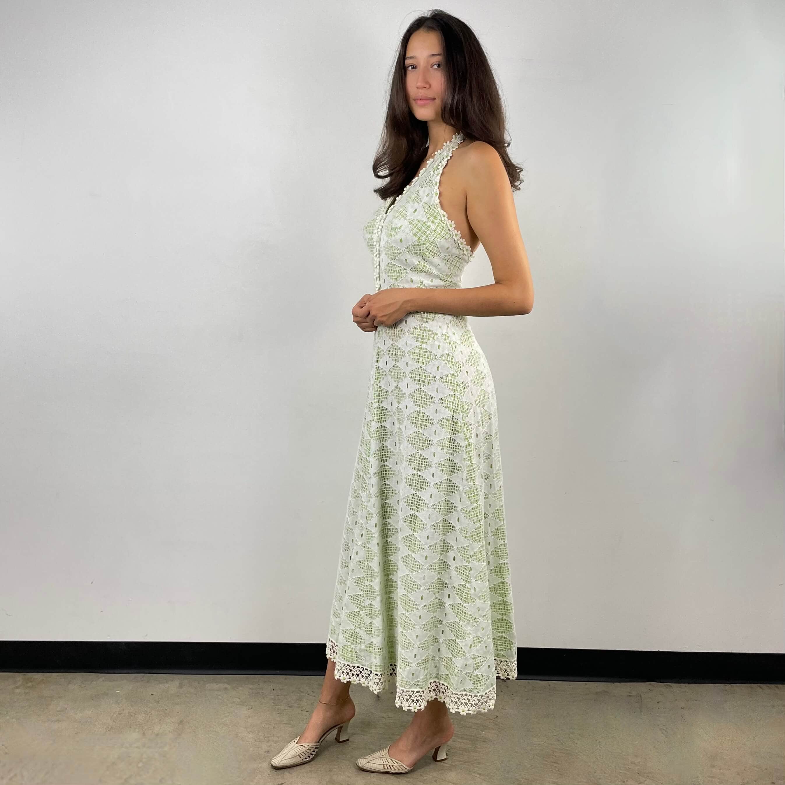 Side view of 1970's Mesh Halter Top Maxi Dress Size Small sold at bohemevintage.com Montreal