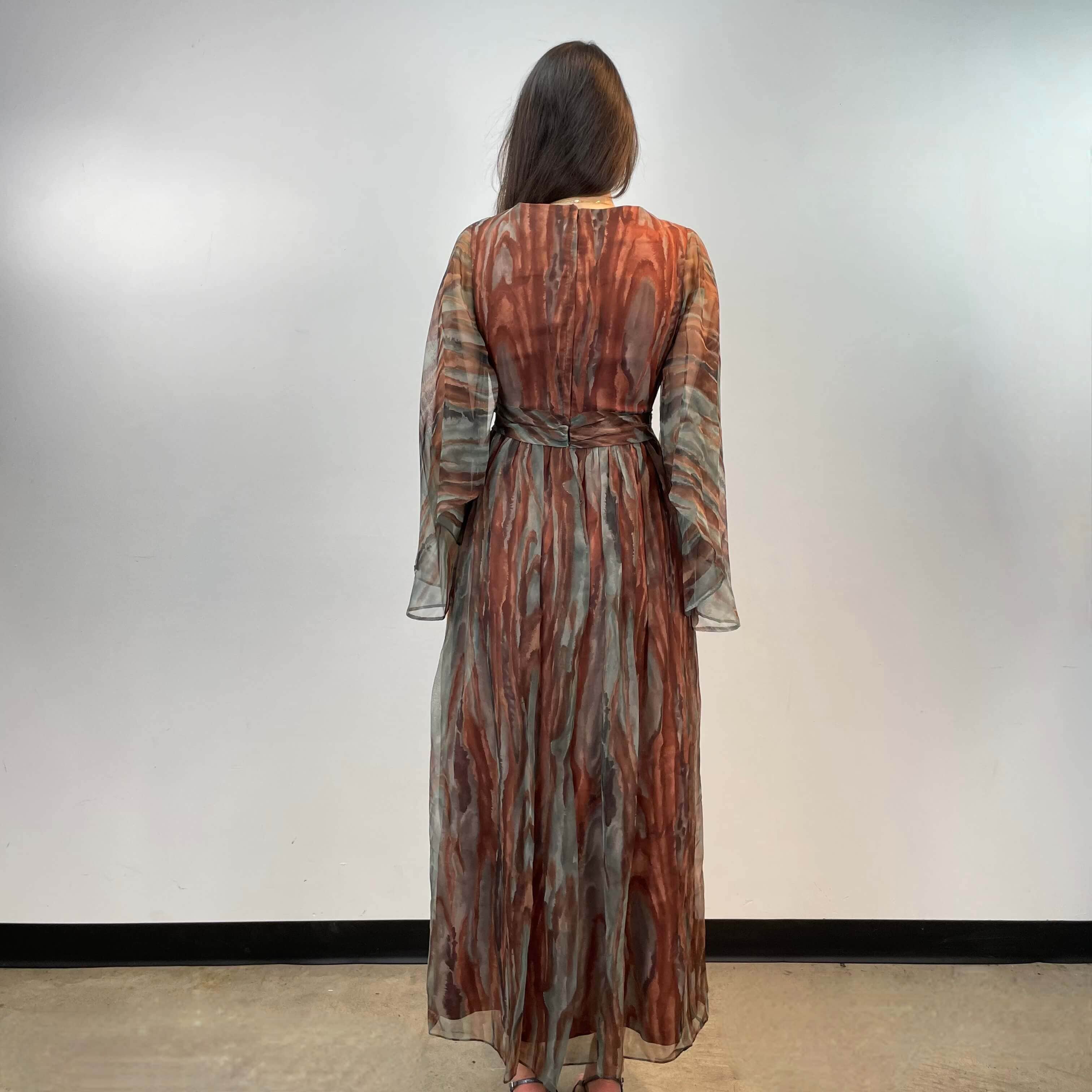 Back view of 1970s Floor-Length Boho Chic Flowy Gown size Small/Medium sold at bohemevintage.com Montreal