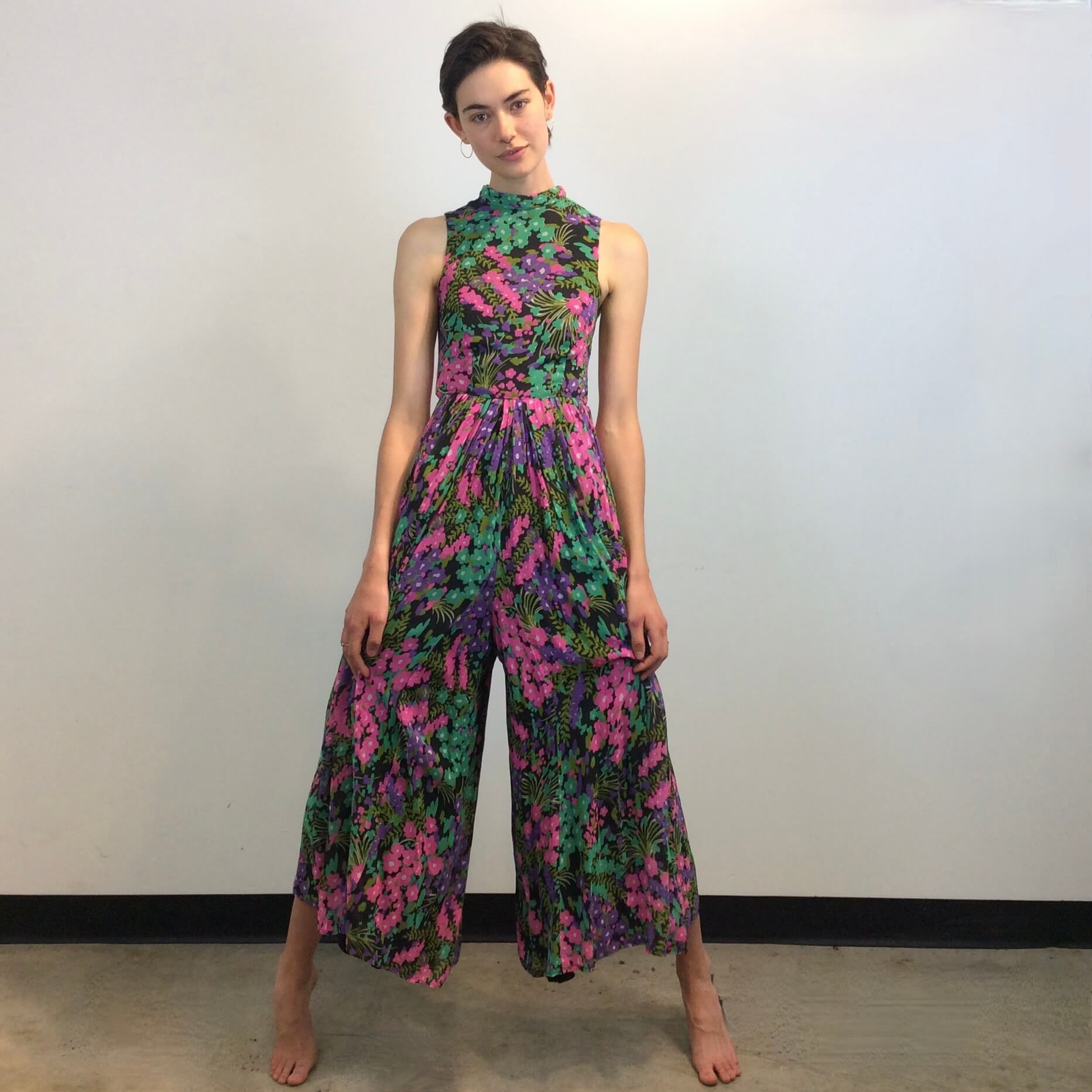 Front view of 1970s Floral Print Wide Leg Jumpsuit Size Small sold at bohemevintage.com Montreal