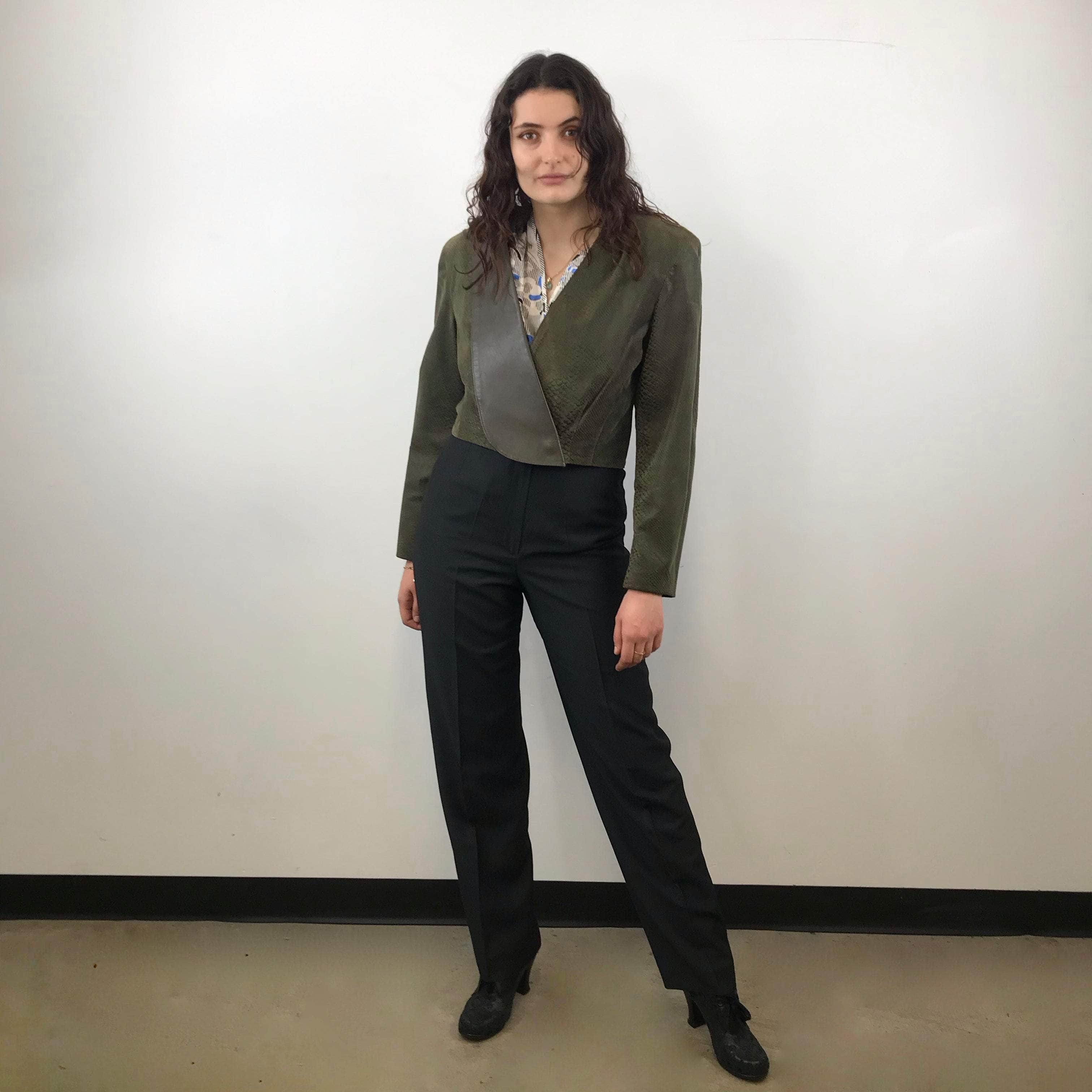  Front view of 1980s Danier Cropped Leather Jacket size Medium  paired with straight leg black trousers sold at bohemevintage.com Montreal