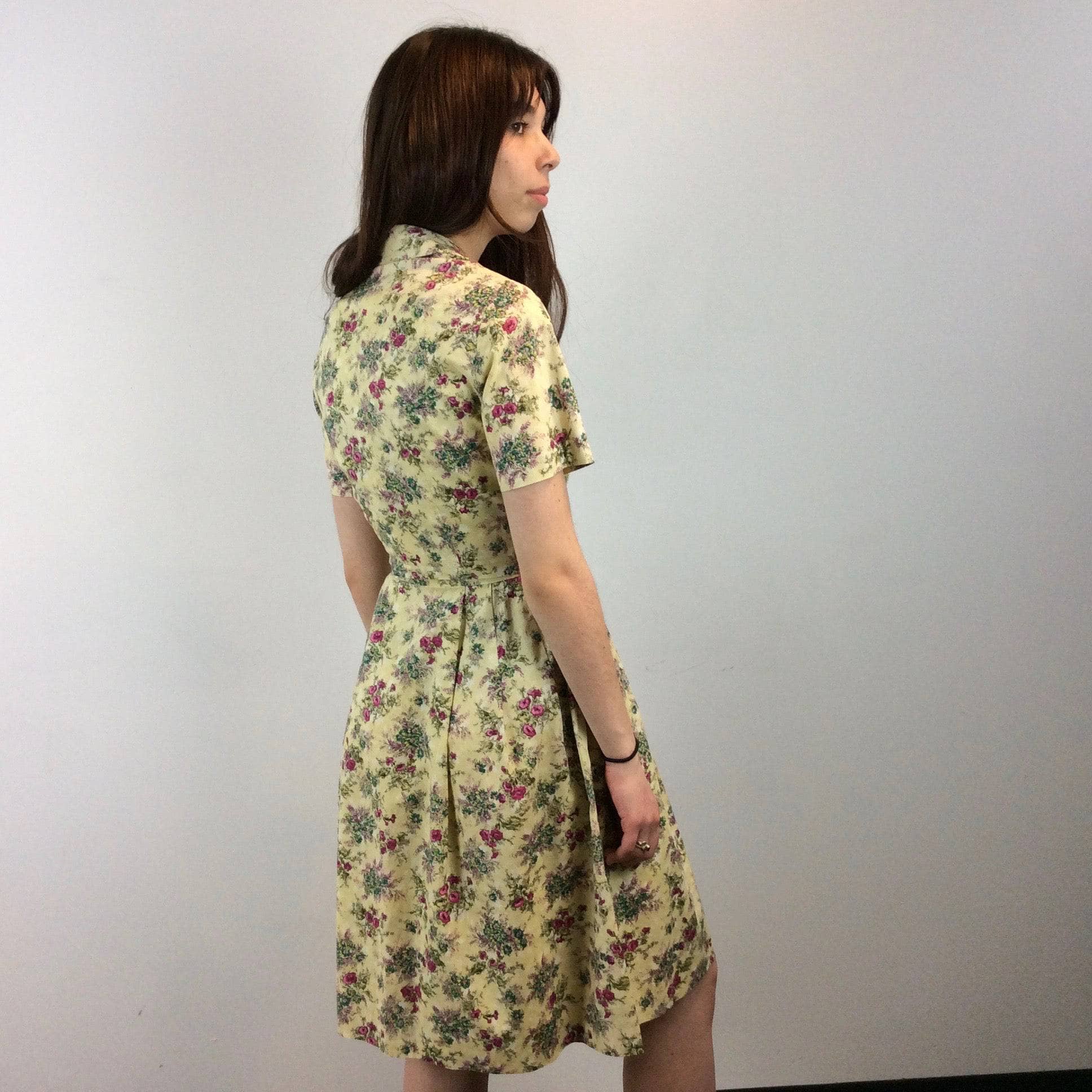 Back view of 1950s-60s Convertible two-piece Yellow Floral Print Cotton Dress and Bolero Jacket Set , Size Small sold by bohemevintage.com Montreal