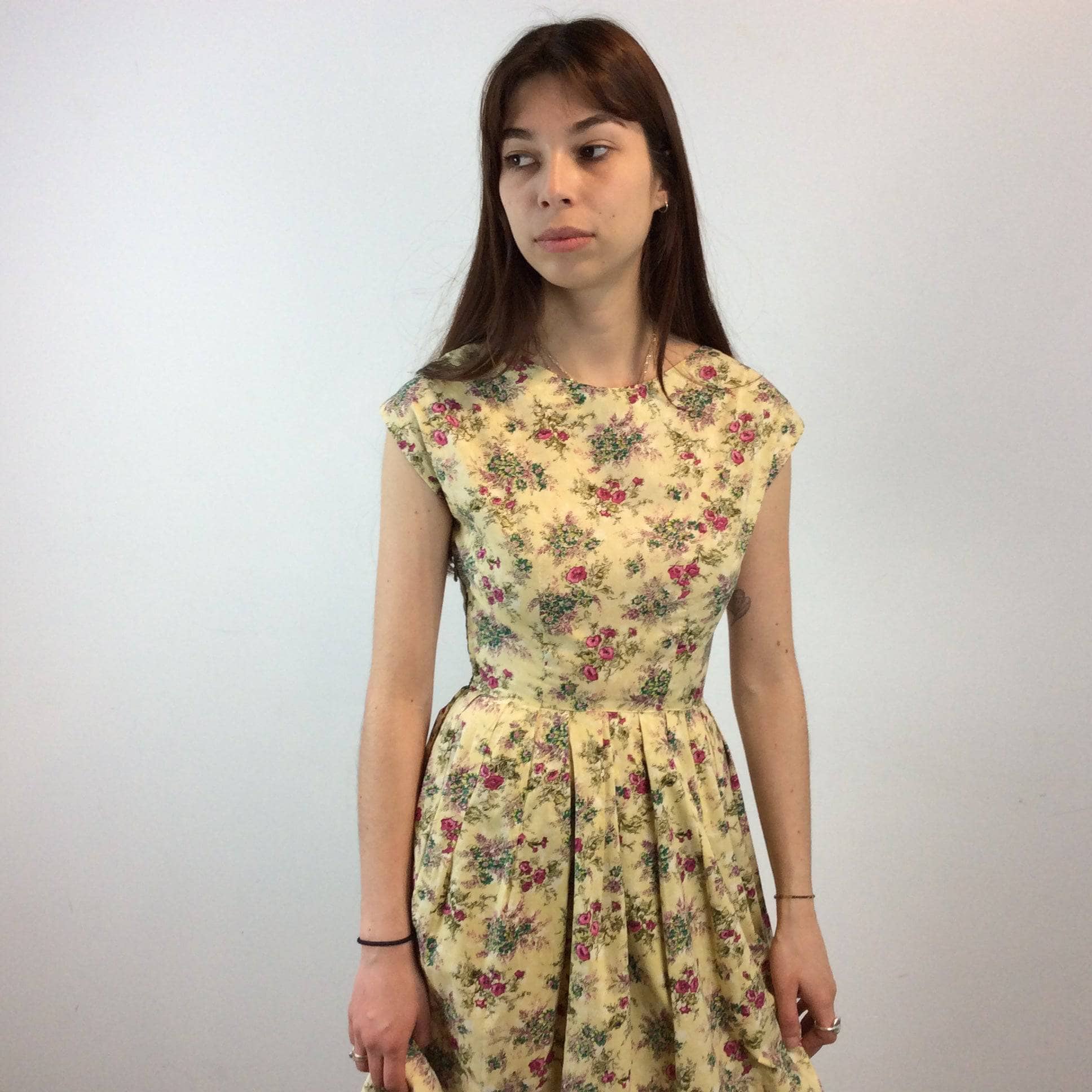 Top of dress from 1950s-60s Convertible two-piece Yellow Floral Print Cotton Dress and Bolero Jacket Set  , Size Small sold by bohemevintage.com Montreal