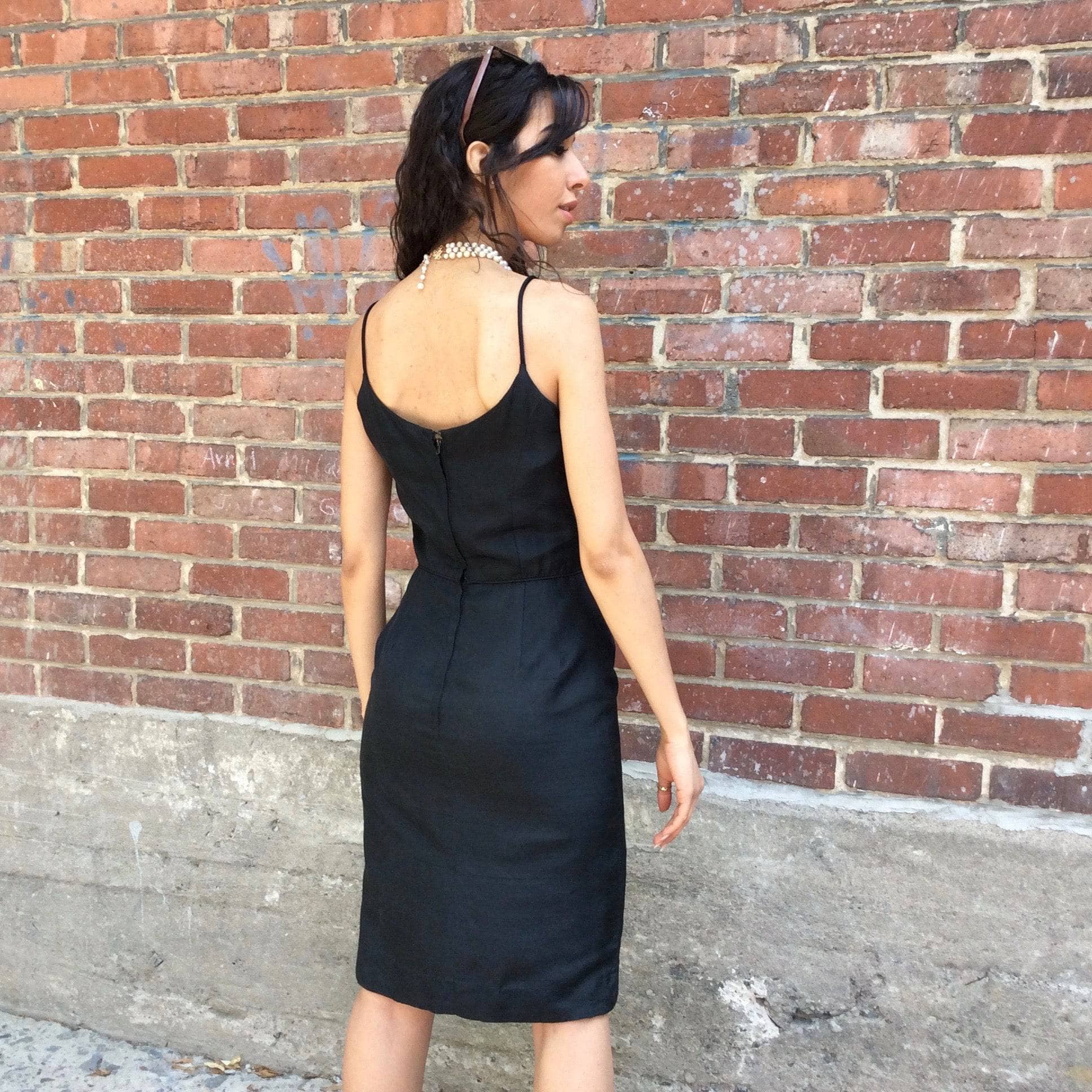 Back View of 1950s Classic Black Silk Cocktail Dress Size Small sold by bohemevintage.com Montreal 