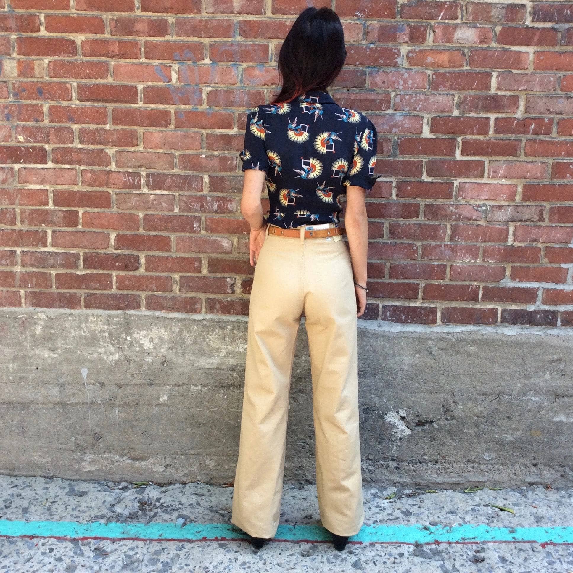 Back view of 1970s "Levi’s" Original High-Waisted Wide Leg Beige Jeans, sold by bohemevintage.com Montréal