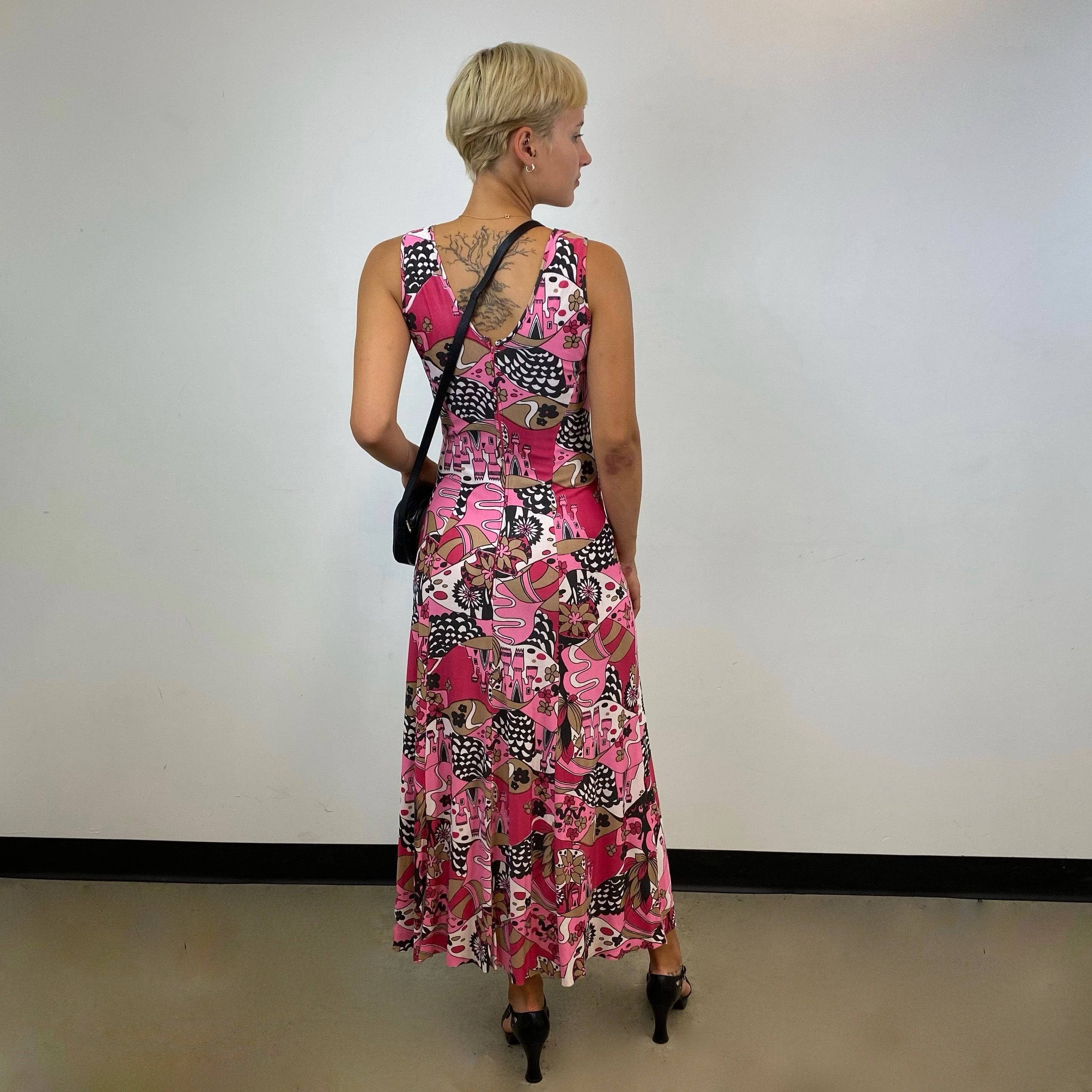 Back view of 1970s Sleeveless Bold Print Maxi Dress size small sold by bohemevintage.com