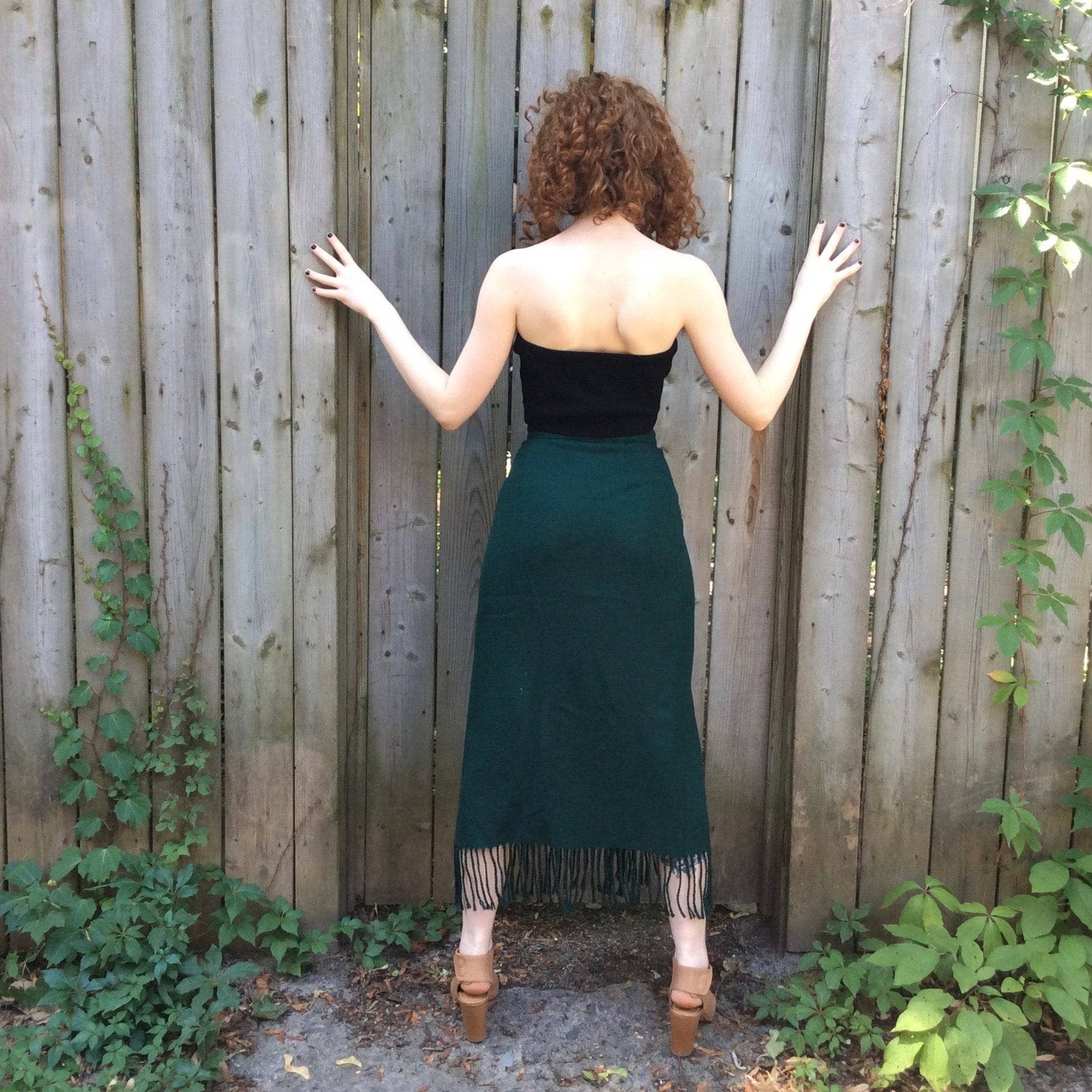 Back view 1980s "Benetton" High waist wrap fringe green Wool skirt, for sale at bohemevintage.com Montréal