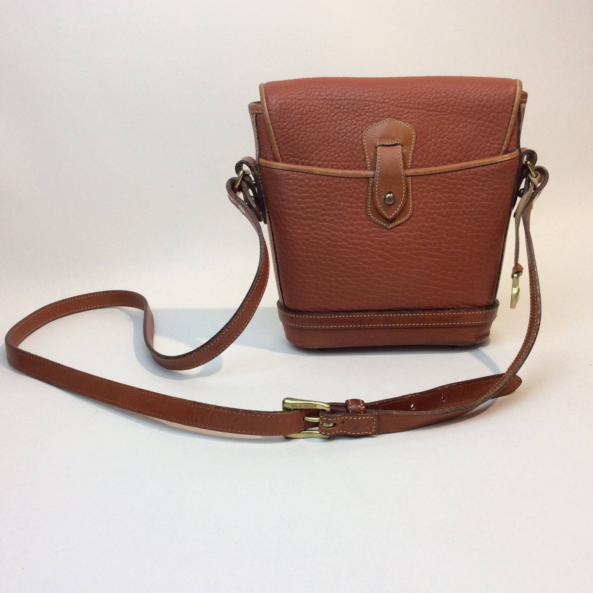 1990s Dooney & Bourke Tan Leather Crossbody Bag. Sold by bohemevintage.com