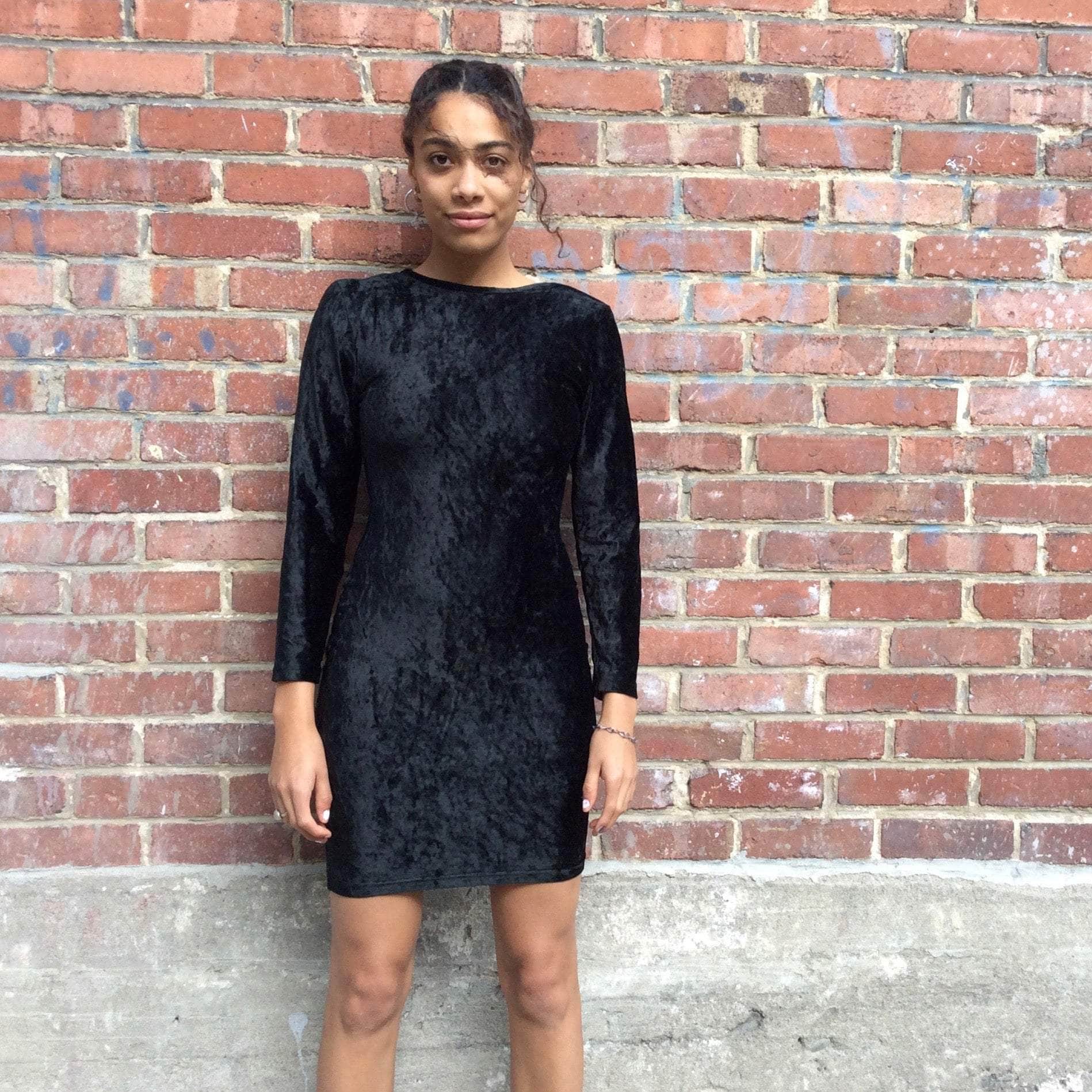 Front View of 1990s Open Back Black Velvet Bodycon Mini Dress Size Small sold at bohemevintage.com Montreal